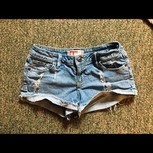 Vintage low rise ripped jean shorts